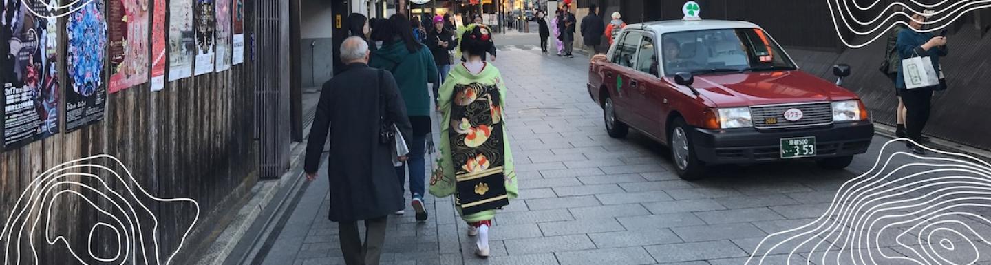 Image of locals walking on a street in Kyoto, Japan
