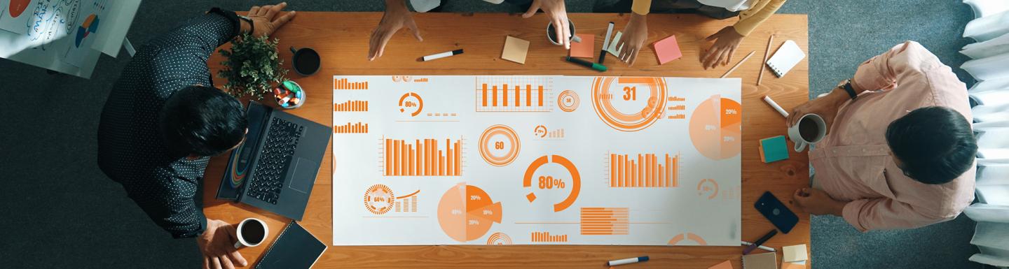 project manager pointing and talking about financial chart or statistic graph at meeting room.