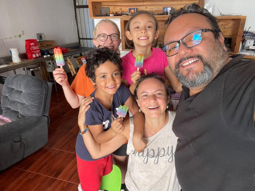 A uo student with their host family