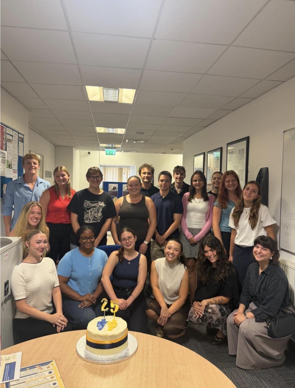 A group of uo students celebrating a birthday