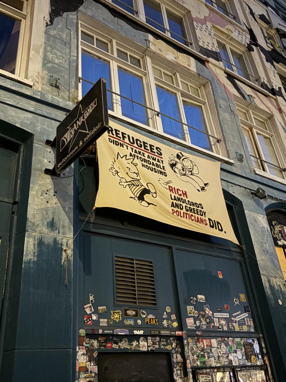 Advocacy signs hanged on balconies in Amsterdam 