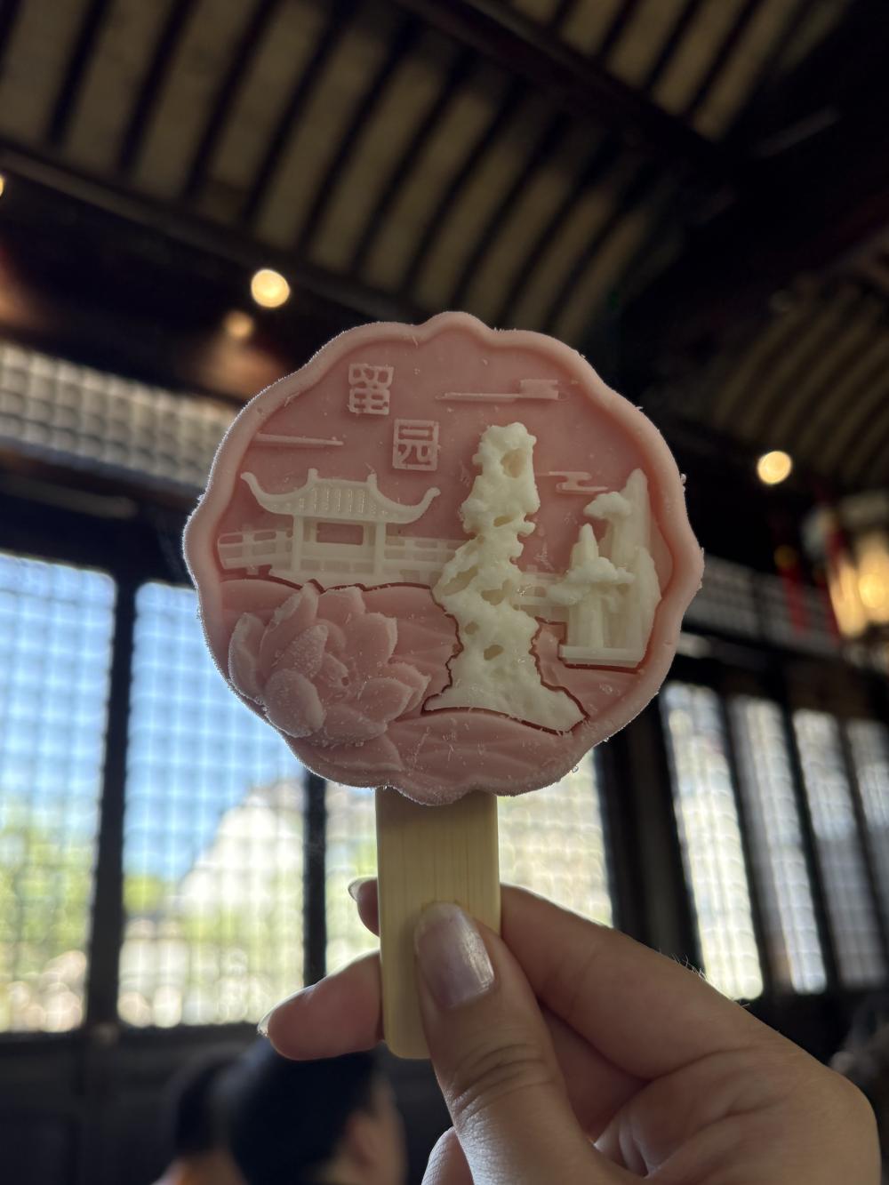 A Chinese popsicle treat with traditional Chinese iconography