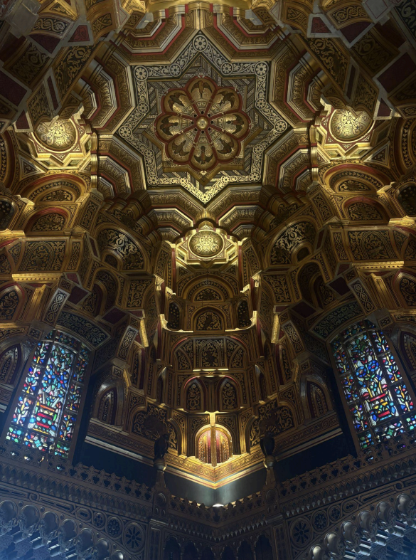 The gold decorated ceiling  of a church in Wales 