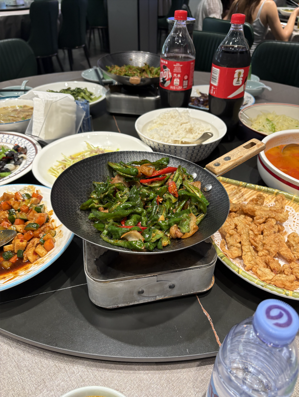 Chinese dishes being shared family style