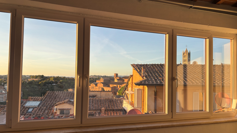A window with a view of an Italian city