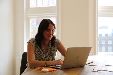 College student working on a laptop