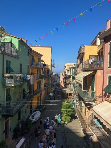Alleyway view of colorful (yellow, green, and red) houses