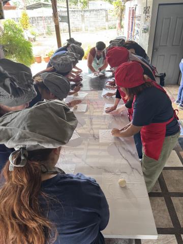 friends cooking in costa rica