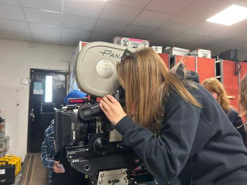 Girl using cinema camera