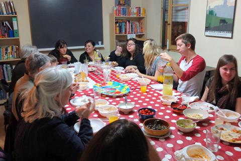 Students and faculty eating at the Siena center