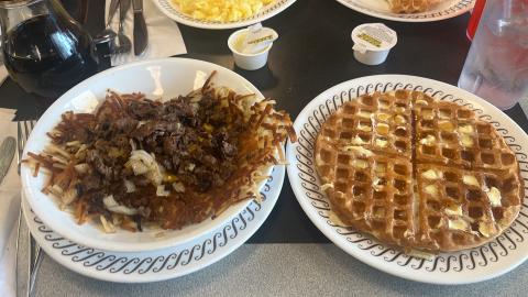 Plate of hash brown scramble and a waffle