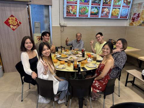 guy eating lunch with friends