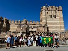 UO students holding flag