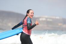 A girl going surfing