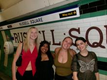 Students gather at Russell Square stop to wait for a train