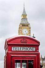 Phone booth in London with Big Ben in the background