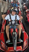 a uo student go carting in Singapore