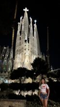 A uo student standing in front of la sagrada familia