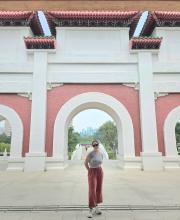 A uo student posing in Singapore