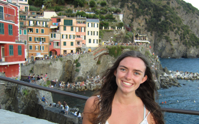 A young woman standing in Italy