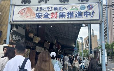 Image of a woman walking on the street in Japan