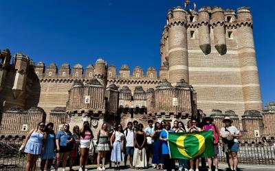 UO students holding flag