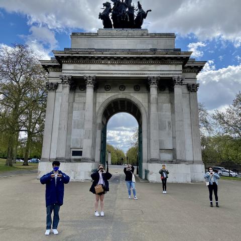 students "throwing the O" in London spring 2021